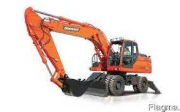 Планировка грунта, устройство котлованов, рытье траншей экскаватором.